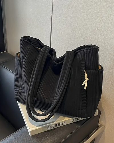 Maria – Bolsa de mano de costura con detalle de cordón
