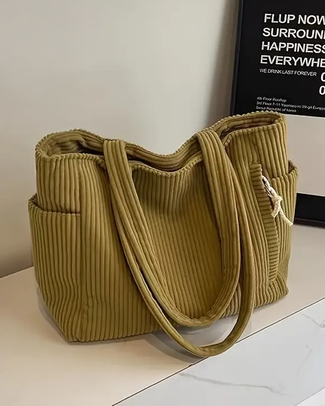 Maria – Bolsa de mano de costura con detalle de cordón