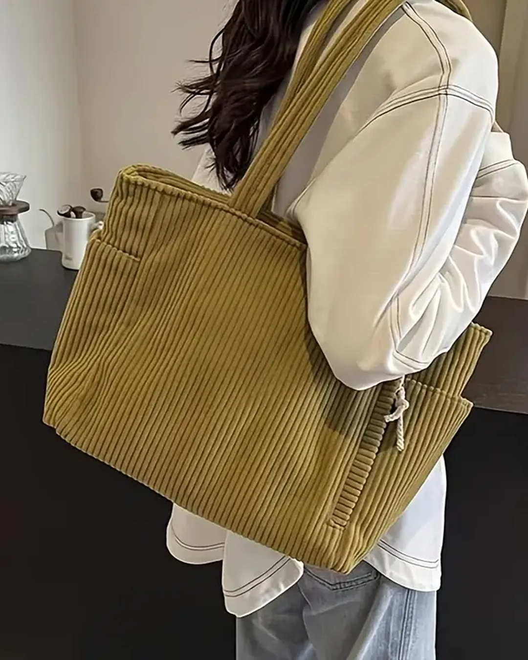 Maria – Bolsa de mano de costura con detalle de cordón